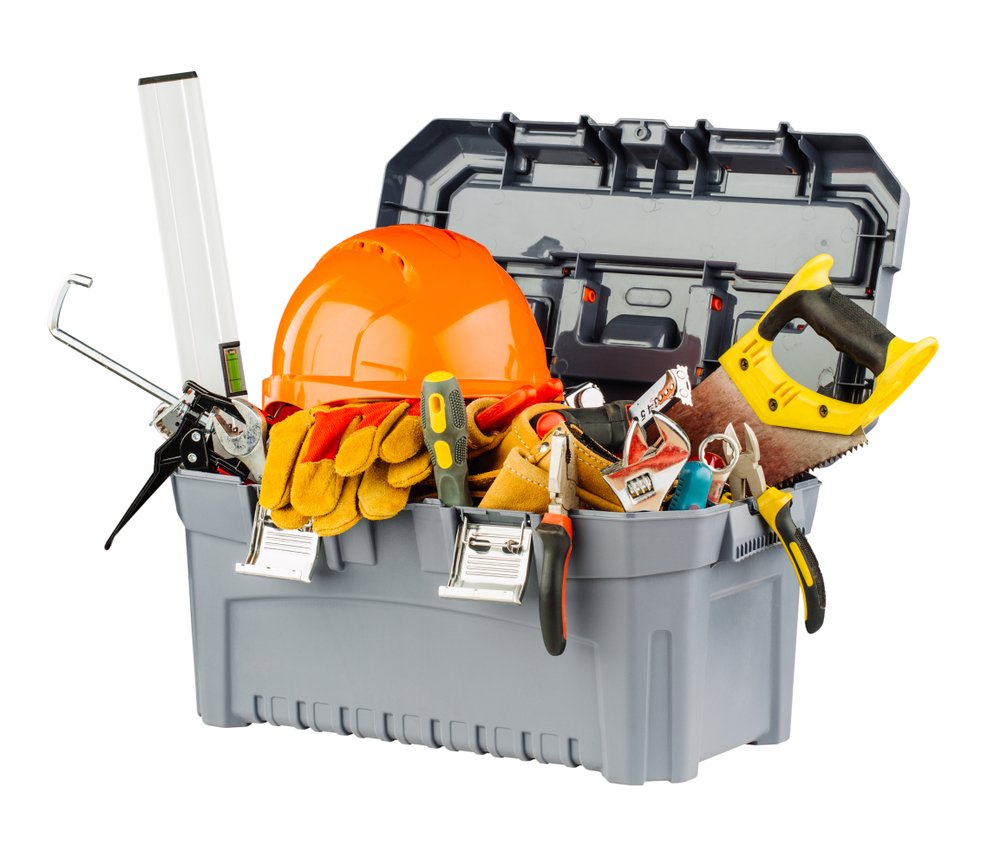 Toolbox filled with construction tools and safety gear